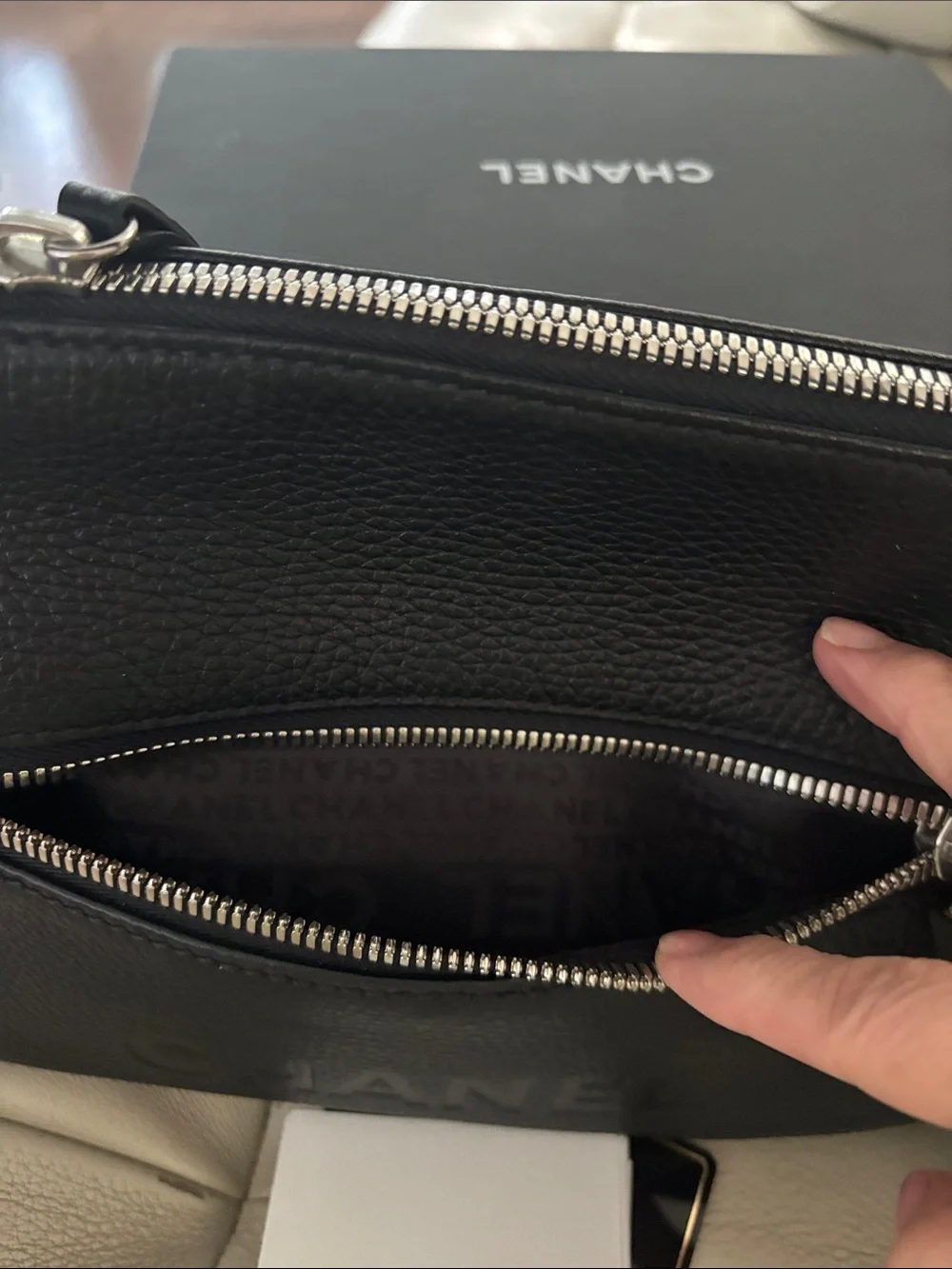 CHANEL Black Pebbled Leather Shoulder Bag with Tassel Zip